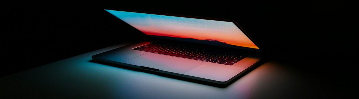 gray and black laptop computer on surface