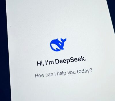 A cell phone with a text message on the screen