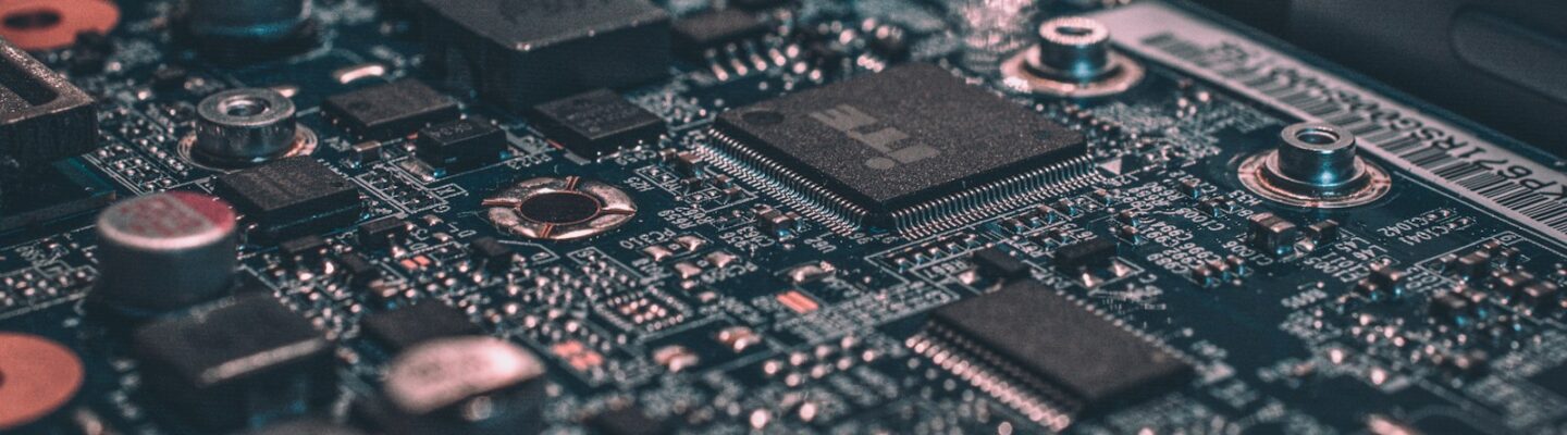 macro photography of black circuit board