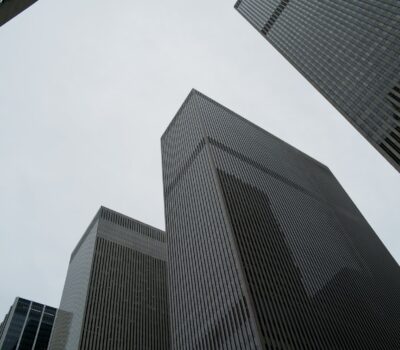 Looking up at tall buildings in a city