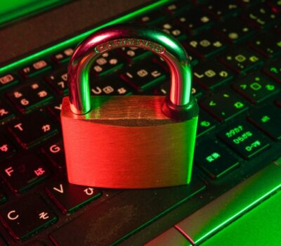 red padlock on black computer keyboard