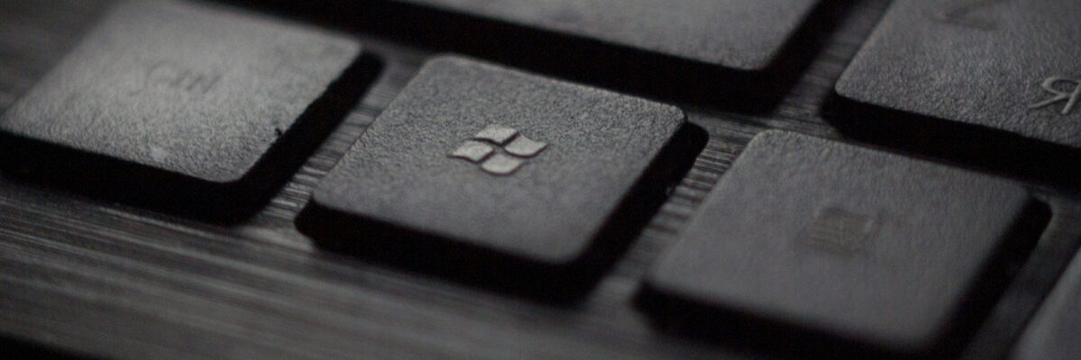 black laptop computer keyboard in closeup photo
