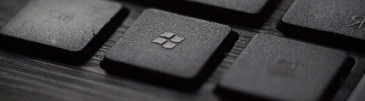 black laptop computer keyboard in closeup photo