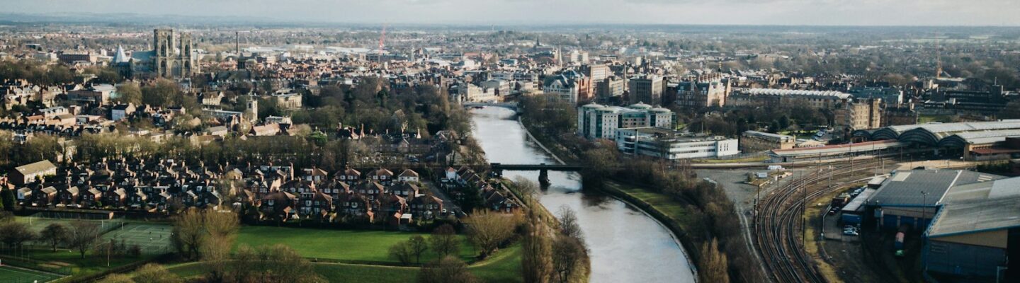 aerial photography of body of water near city at daytime