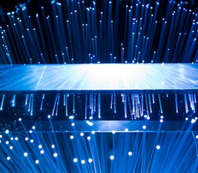 a large display of blue lights in a dark room