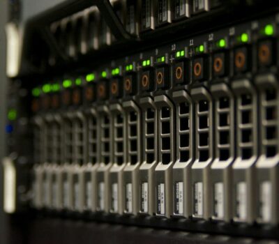 Server rack with blinking green lights