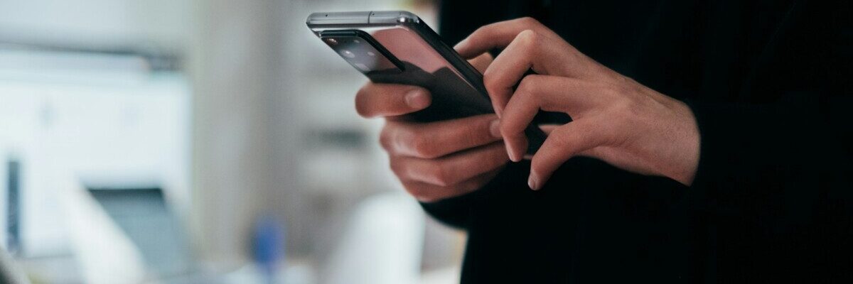 person holding black android smartphone