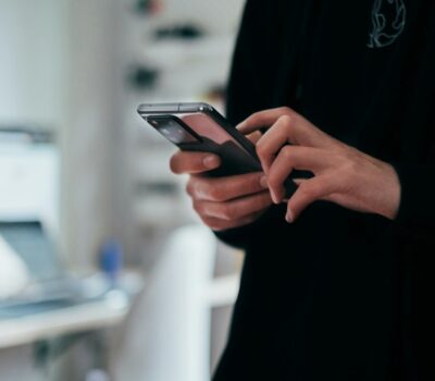 person holding black android smartphone
