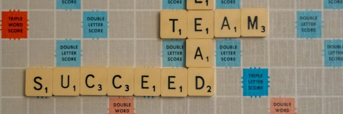 scrabbled scrabble tiles with words on them