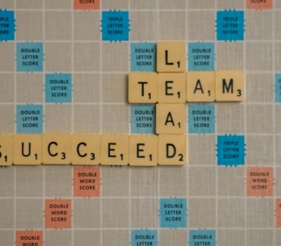 scrabbled scrabble tiles with words on them