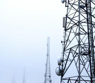 a tower with several cell phones on top of it