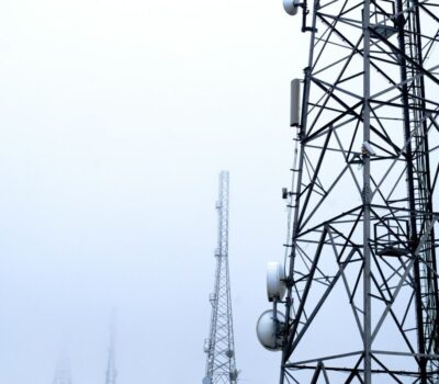 a tower with several cell phones on top of it