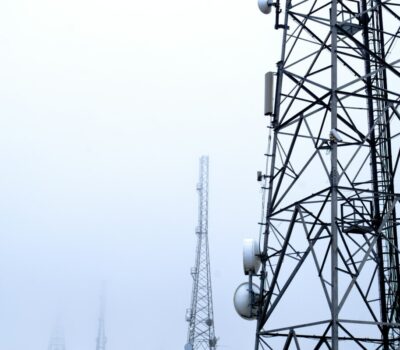 a tower with several cell phones on top of it