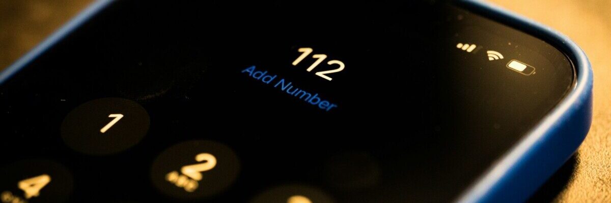 a close up of a cell phone on a table