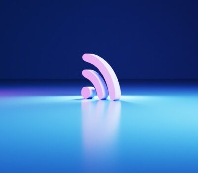 a blue and purple background with a curved object in the middle